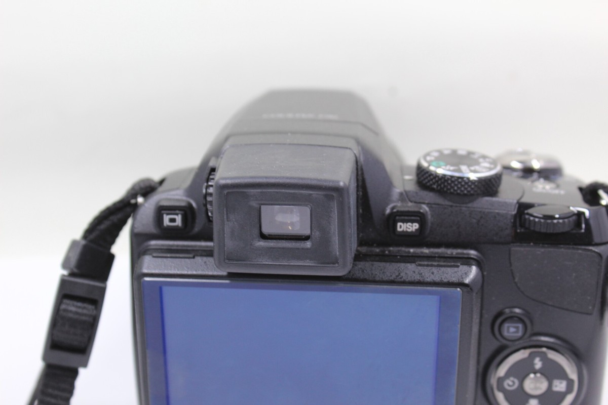 Nikon COOLPIX P90 Camera – 12.1MP, 24x Zoom, ED Lens + Battery