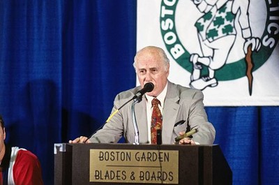 Boston Celtics President Red Auerbach speaks to the media during a- Old Photo 1