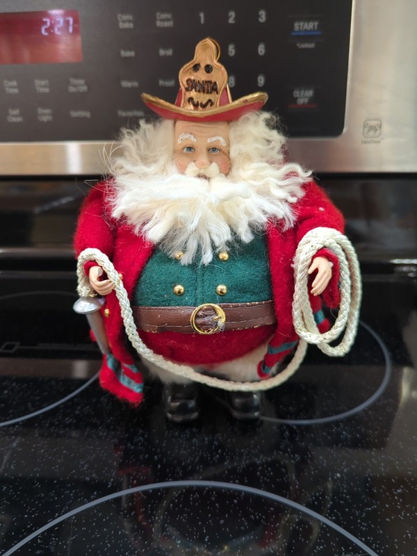 Santa Fireman Christmas Ornament - Holding Fire Hose