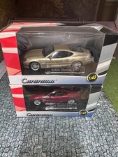 Pair of ASTON MARTIN DB7 in Red & Gold. New in Box. 1:43 Scale