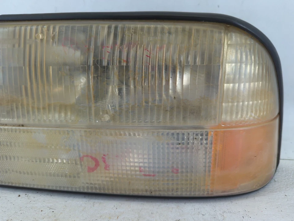 Lámpara de faros delanteros izquierda OEM GMC JIMMY DRIVER UELMJ Foto 3 de 4