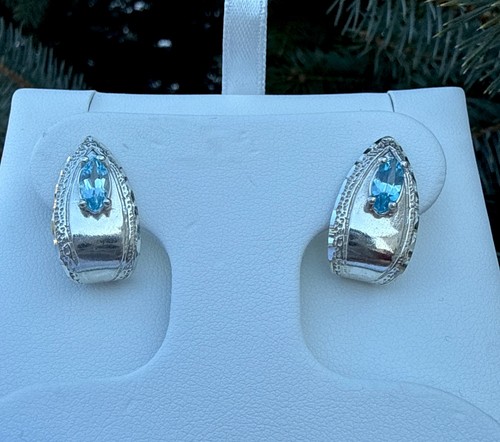 UTC Jewelry Co. 925 Ster.Silver Ultimate Trading Company, Blue Topaz Earrings.