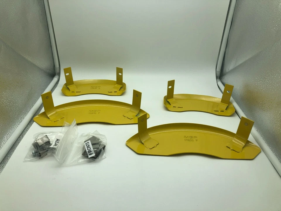 CUBIERTAS DE PINZA MGP 2013 A 2018 FORD FOCUS ST AMARILLO NUEVO EXCESO DE EXISTENCIAS Foto 2 de 4