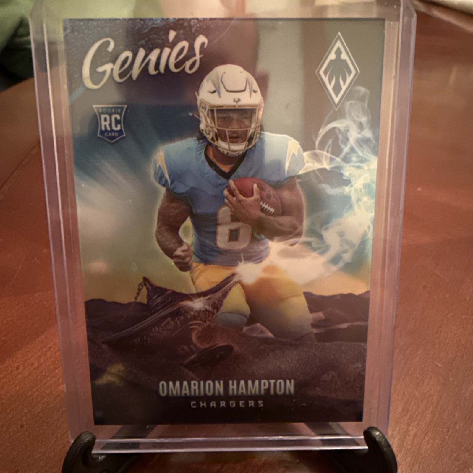 2025 Panini Phoenix Football Omarion Hampton RC Genies SSP #16 Case Hit Chargers