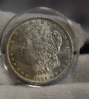 1884 O US Morgan Silver Dollar $1 Unc Edge Toning