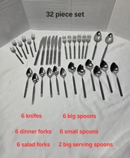 Set Of 32 Piece  W.M.A Rogers Deluxe Stainless Oneida LTD Flatware