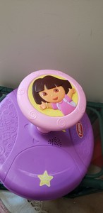 dora sit and spin