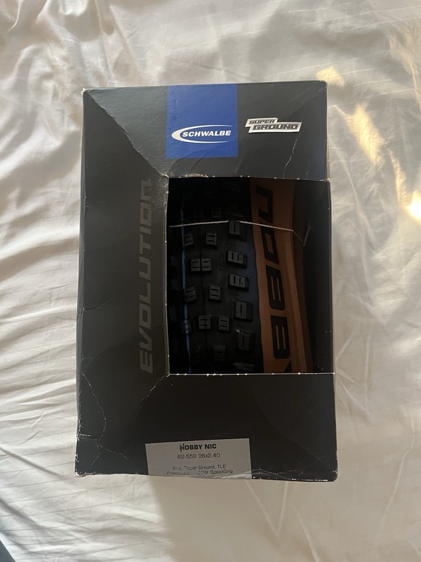 Schwalbe Nobby Nic 26in x 2.40 EVO Tubeless Mountain Bike Tyre Black/Brown Wall
