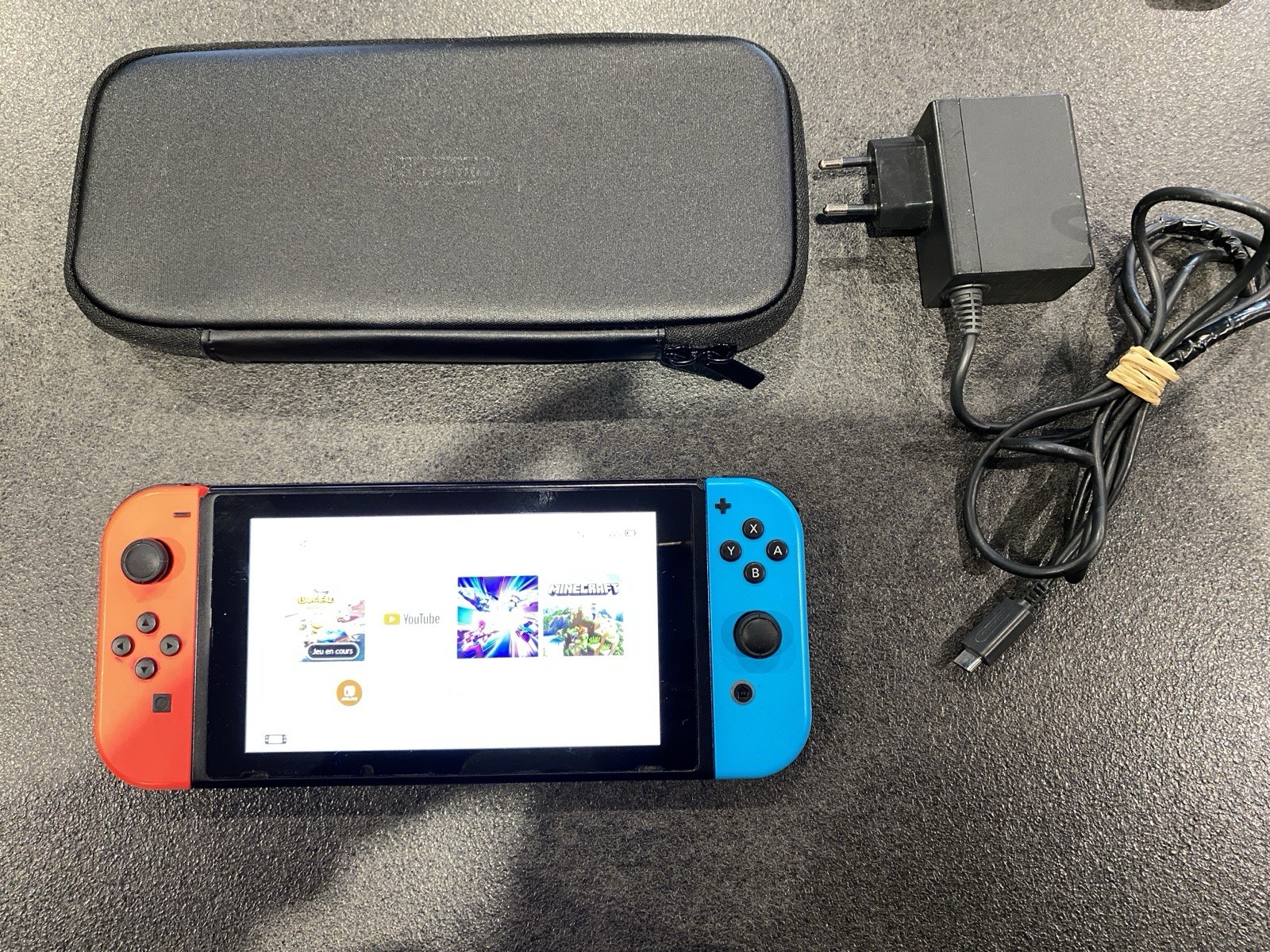 Console officielle Nintendo Switch testée fonctionnelle joycons + jeu sans code