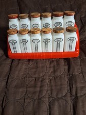 Set Of 12 Griffiths' Milk Glass Spice Jars Plus Red Plastic Hanging , Sitting...
