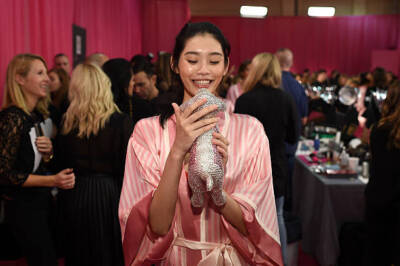 Ming Xi is seen backstage before the 2015 Victoria's Secret Fashio - Old Photo