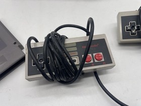 Nintendo NES console 2 Controllers And 1 Game - No Cables. UNTESTED