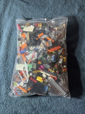 3-4 pounds of Legos in a bag. Random pieces with no instructions.