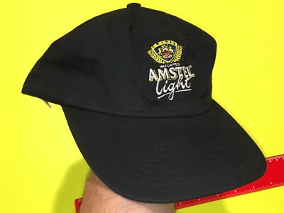 NEW / UNUSED ~ IMPORTED AMSTEL LIGHT ~ BLACK BASEBALL CAP / HAT ADJUSTABLE