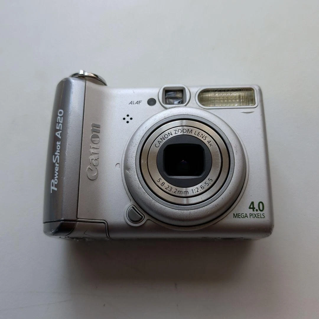Preços baixos em Câmeras digitais Canon PowerShot A520 com Carimbo