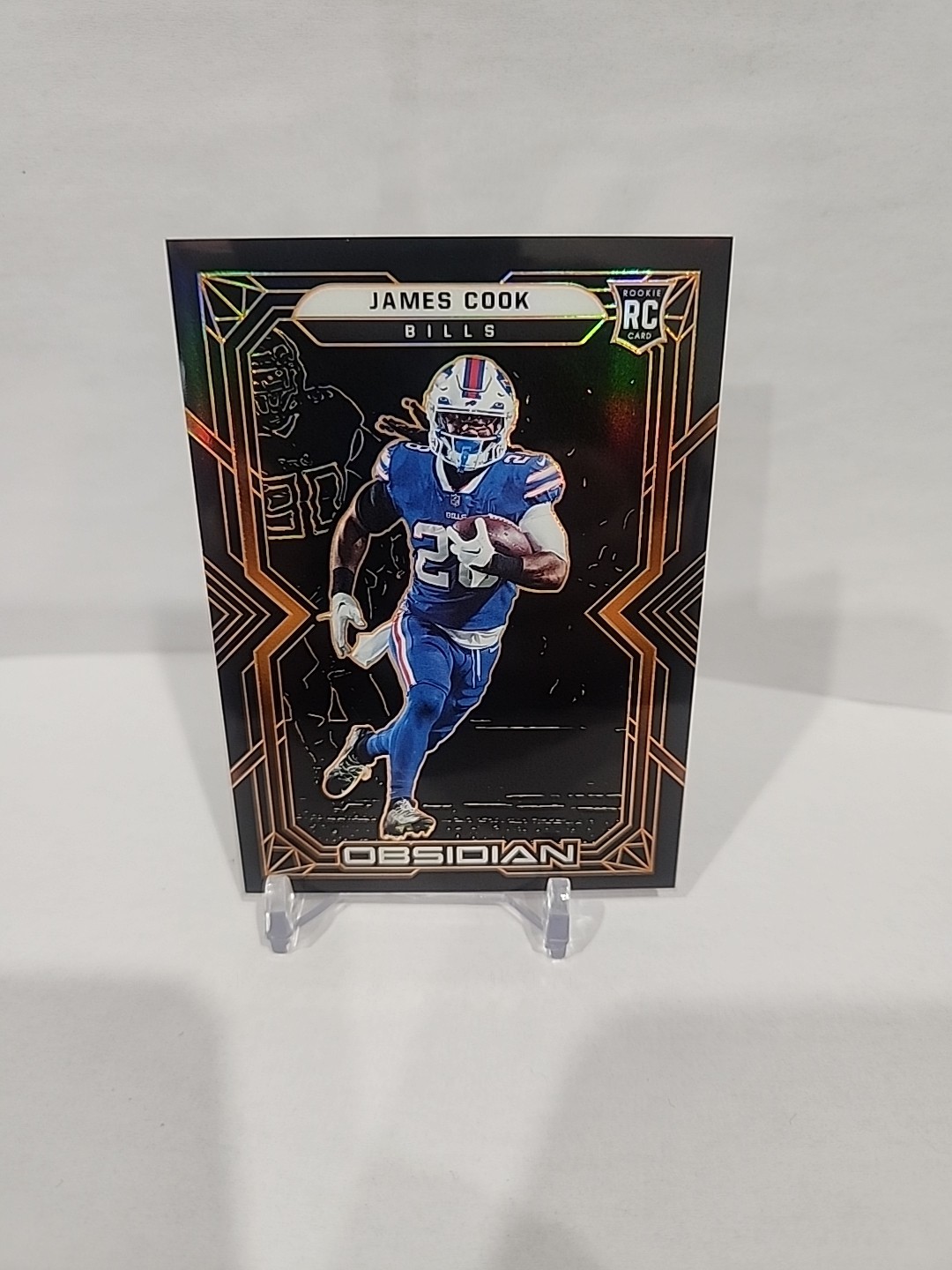 2022 Panini Obsidian - Rookies James Cook #109 Electric Etch Orange /75 (RC)