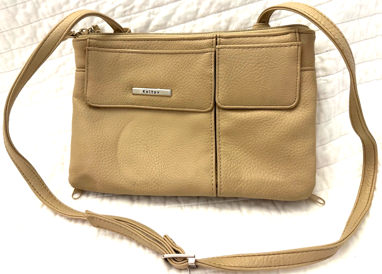 Koltov Crossbody Bag Multi Exterior Zipper Pockets In A Pebbled Vegan Leather