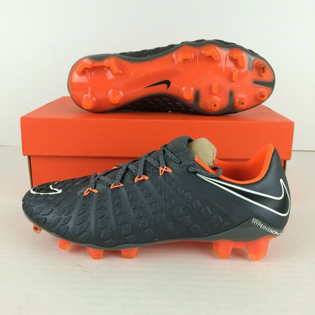 grey and orange soccer cleats