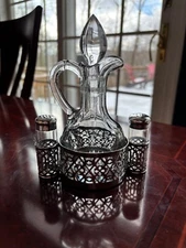 VINTAGE E. & J.B. GLASS CRUET AND SALT & PEPPER SHAKERS IN SILVER PLATED HOLDER
