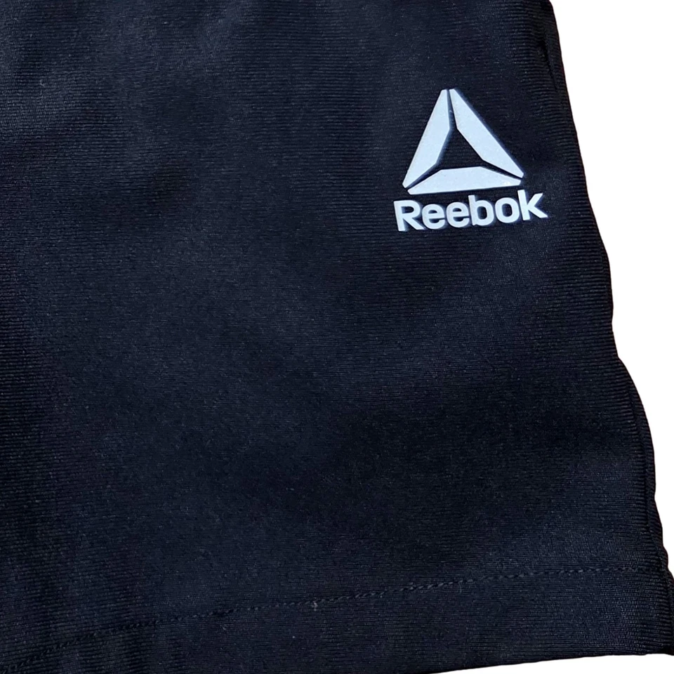 Pantalones Cortos Atléticos Reebok Victory Negros Bolsillo con Cremallera para Niños Foto 2 de 3