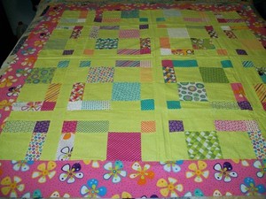 machine sewn bright colors quilt top