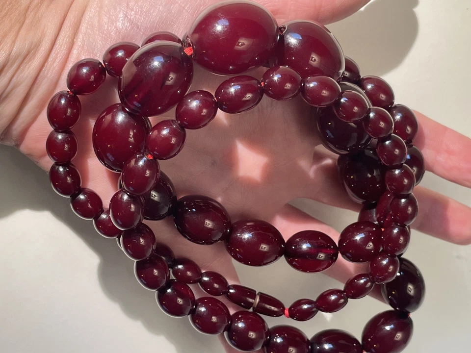 112.97grams opera length Cherry Amber Bakelite bead Necklace Internal Streaking  - Image 4 of 4