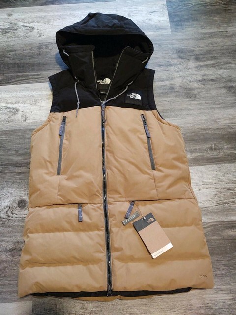 khaki and black north face jacket