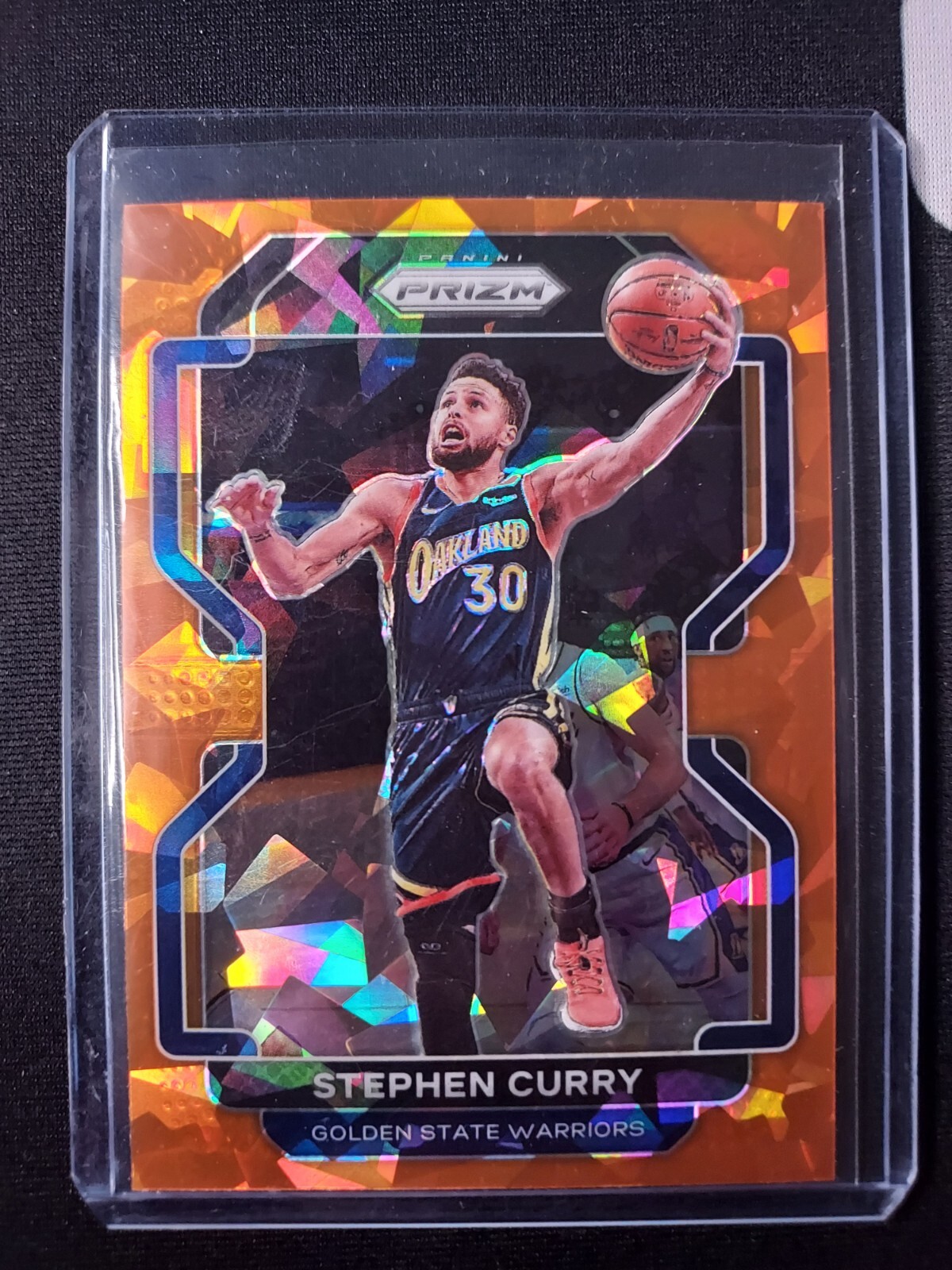 2021-22 Prizm Orange Cracked Ice Prizm Stephen Curry #154 SSP Goat 3 Point Shot