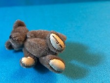 MINIATURE 2" JOINTED LIGHT BROWN PLUSH TEDDYBEAR WITH "MISSING YOU" ON LEFT FT.