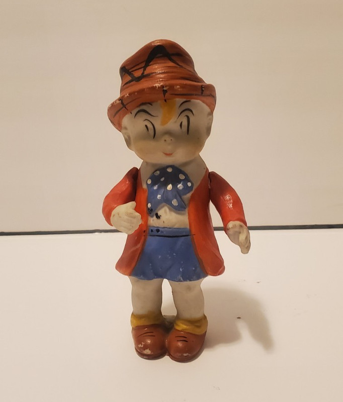 Vintage Porcelain  "Skippy" Figurine.