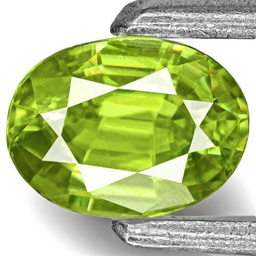 INDIA Sfene 0,42 Cts Naturale Non Trattata Verde Neon Luminoso Ovale - Foto 1 di 2