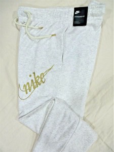 gold nike sweatpants