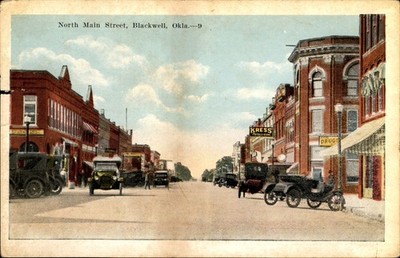 Vintage North Main Street Blackwell OK White Border Postcard Kress Cars Bank