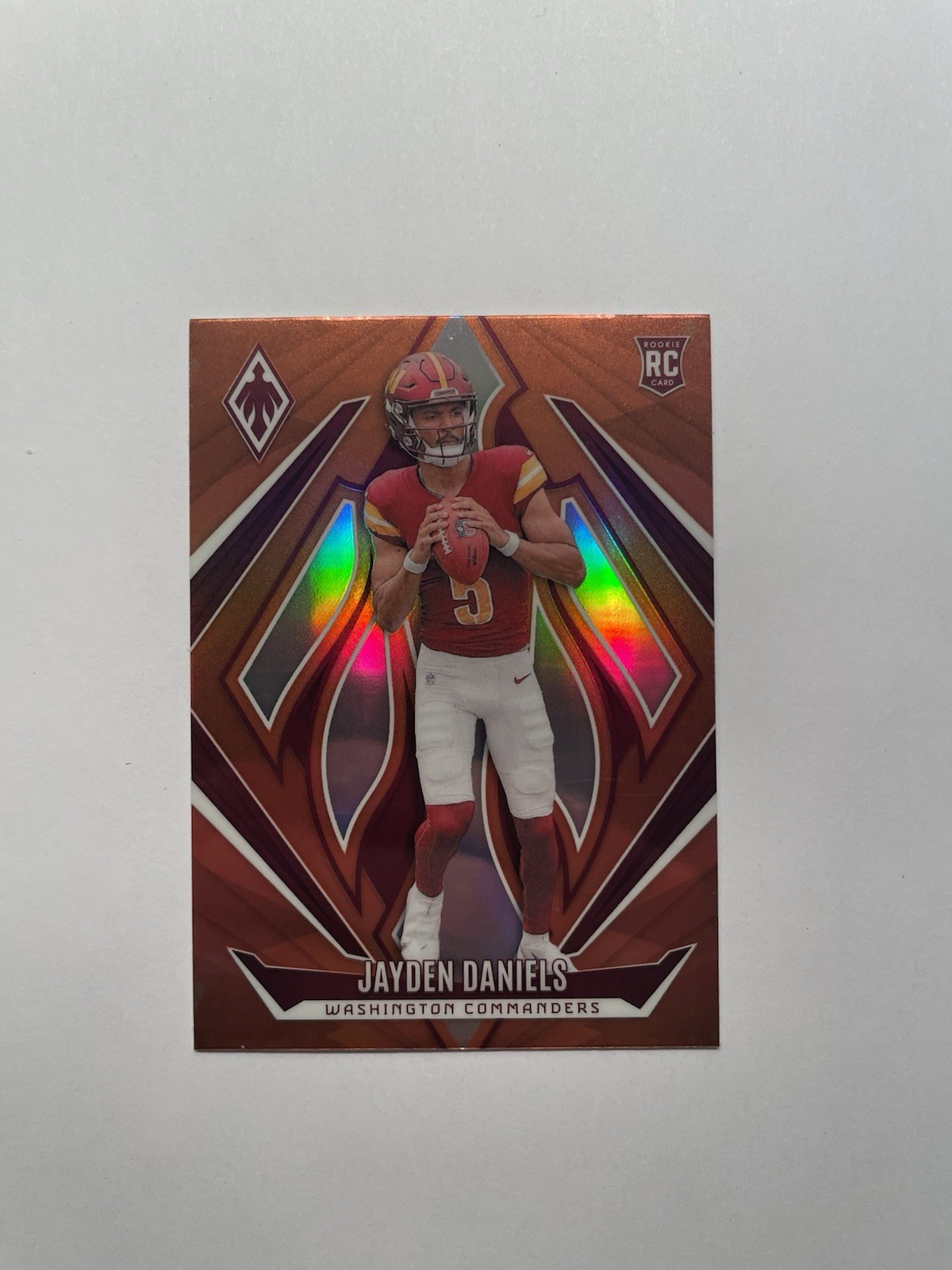 2024 Panini Phoenix - Rookies Jayden Daniels #198 Orange (RC)