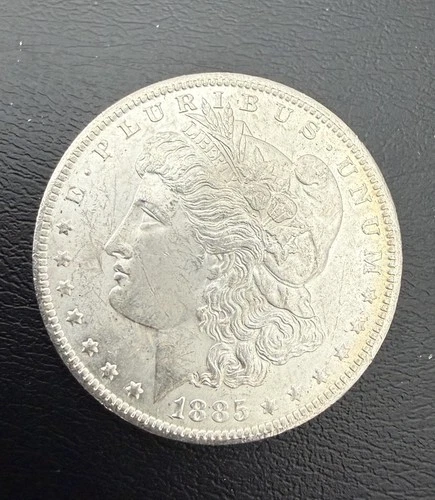 1885 O BRILLIANT UNCIRCULATED MORGAN DOLLAR