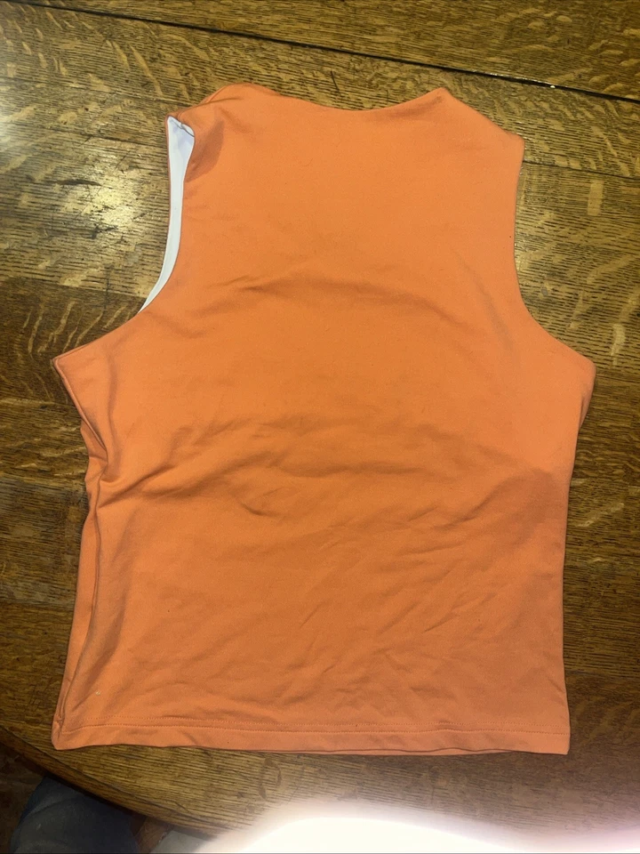 Regata feminina Mountain Hard Wear tamanho médio com prateleira sutiã laranja/pêssego Colo - Imagem 4 de 4