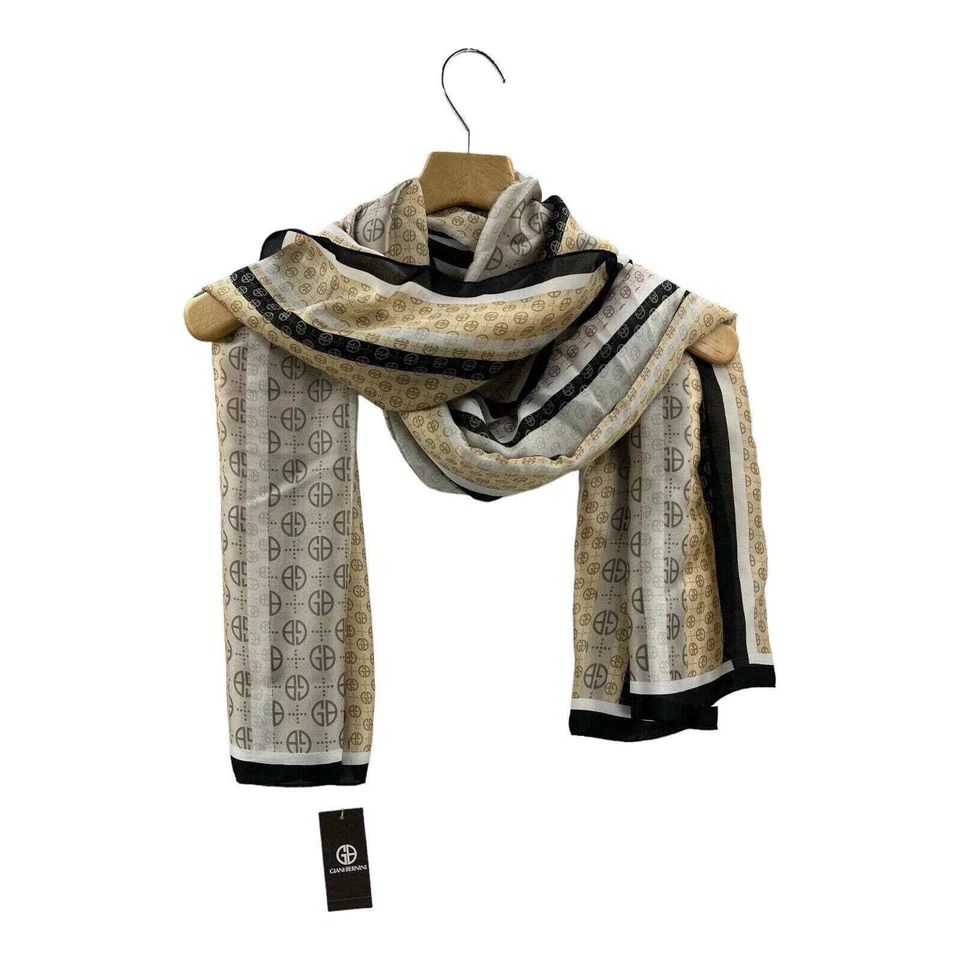 Giani Bernini, bufanda oblonga con logotipo a rayas, precio de venta sugerido por el fabricante 34,50 USD Foto 2 de 4