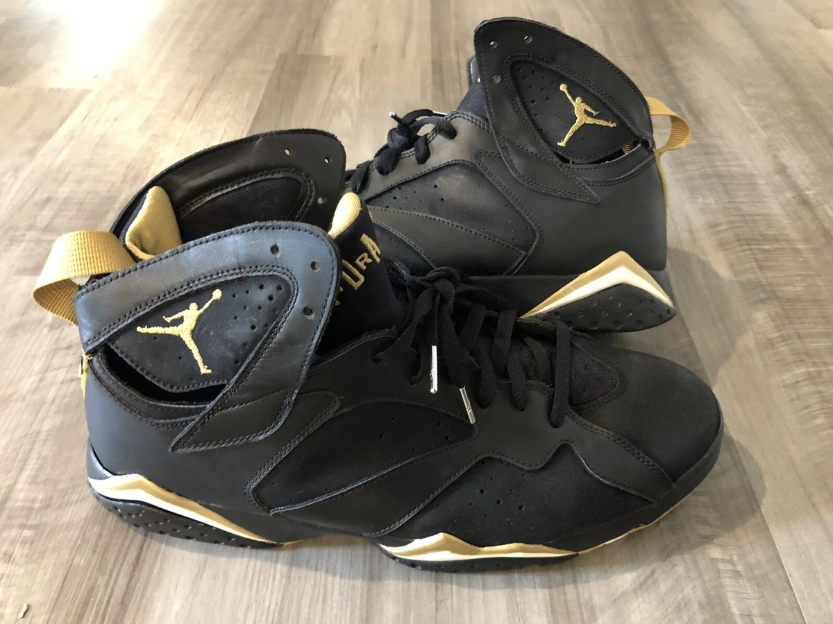 jordan retro 7 black and gold Cinosural International School