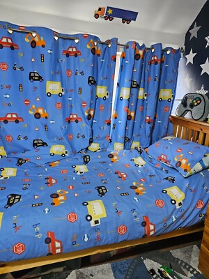 Dunelm boys car print blue eyelet curtains and X single bed
