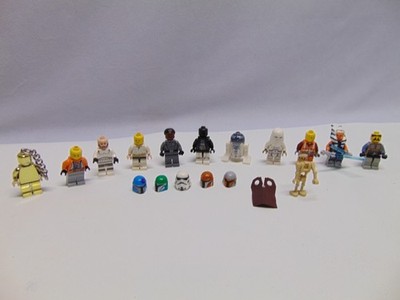 (12) LEGO Star Wars mini figures & Accessories Helmets R2D2 Ahsoka Tano Storm