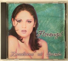 Florangel Latin CD Devuelveme Mi Corazon Slight Wear Used