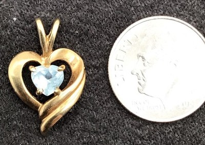 Ladies Heart Shaped Pendant With Blue Heart Shaped Stone 1.28gr 10k Yellow Gold