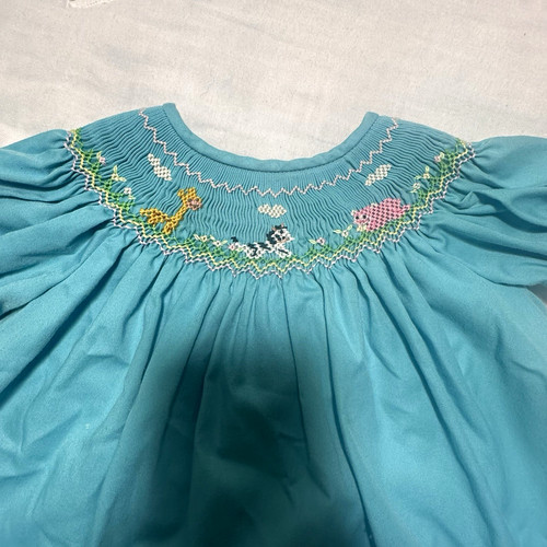 Rosalina Collection Smocked baby dress Size 6-9 months.