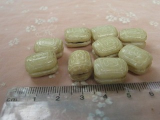 10 HAND CARVED NEPHRITE BEADS