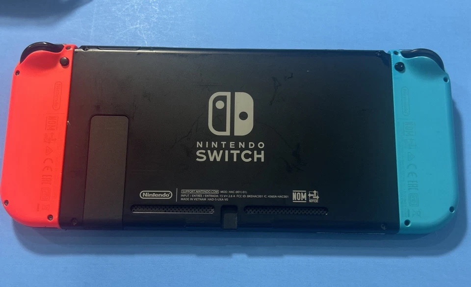 Nintendo Switch con Joy Con Azul Neón y Rojo Neón Paquete Completo Con Juegos Foto 4 de 4
