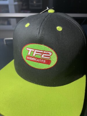 TF2 LUBRICANTS BLACK & GREEN CAP WITH TAG