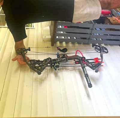 Mathews solo can bow with everything on it including 6 arrows and release.