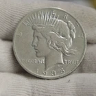 1935 US Peace Silver Dollar $1 Fine (Cleaned,Rim Nick)
