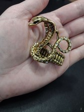 Gold tone rhinestone snake ring