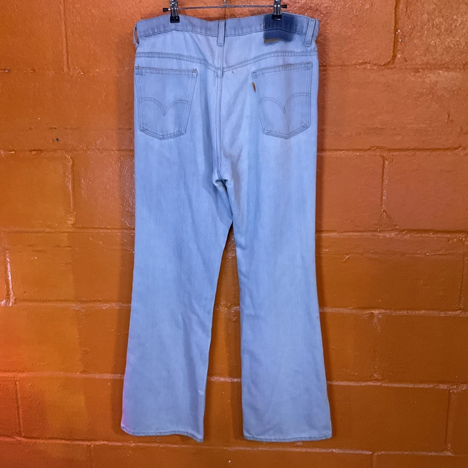 Jeans lavado com aba laranja 60’s/70’s Levi’s tamanho 38/32 - Imagem 4 de 4